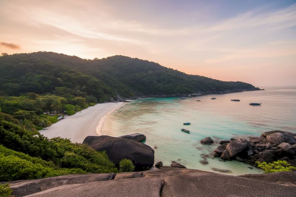 Cham Islands form a UNESCO-recognized biosphere reserve known for vibrant coral reefs, diverse marine life, and traditional fishing villages